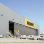 Butler metal building airplane hangar door engineered for hydraulic or bifold operation with Powerlift