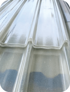 Butler wall light transmitting panels made of high‑strength white fiberglass form‑fitted to Butler Rib II metal wall profile for natural daylighting