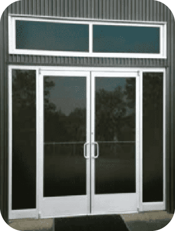 Butler Building aluminum storefront door with 10‑inch ADA bottom rail, insulated glazing, and optional sidelites or transoms