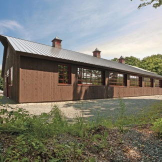 Butler metal building designed as a modern barndominium with durable steel framing and open‑concept layout.