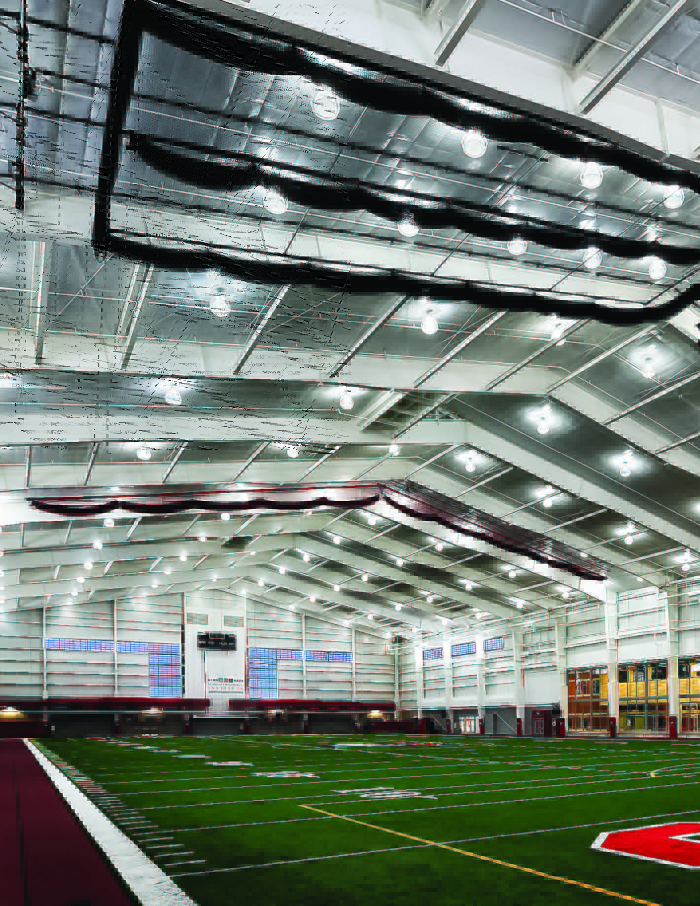 Butler metal building designed for gymnasiums and sports arenas with wide‑span steel framing and athletic‑facility layout.