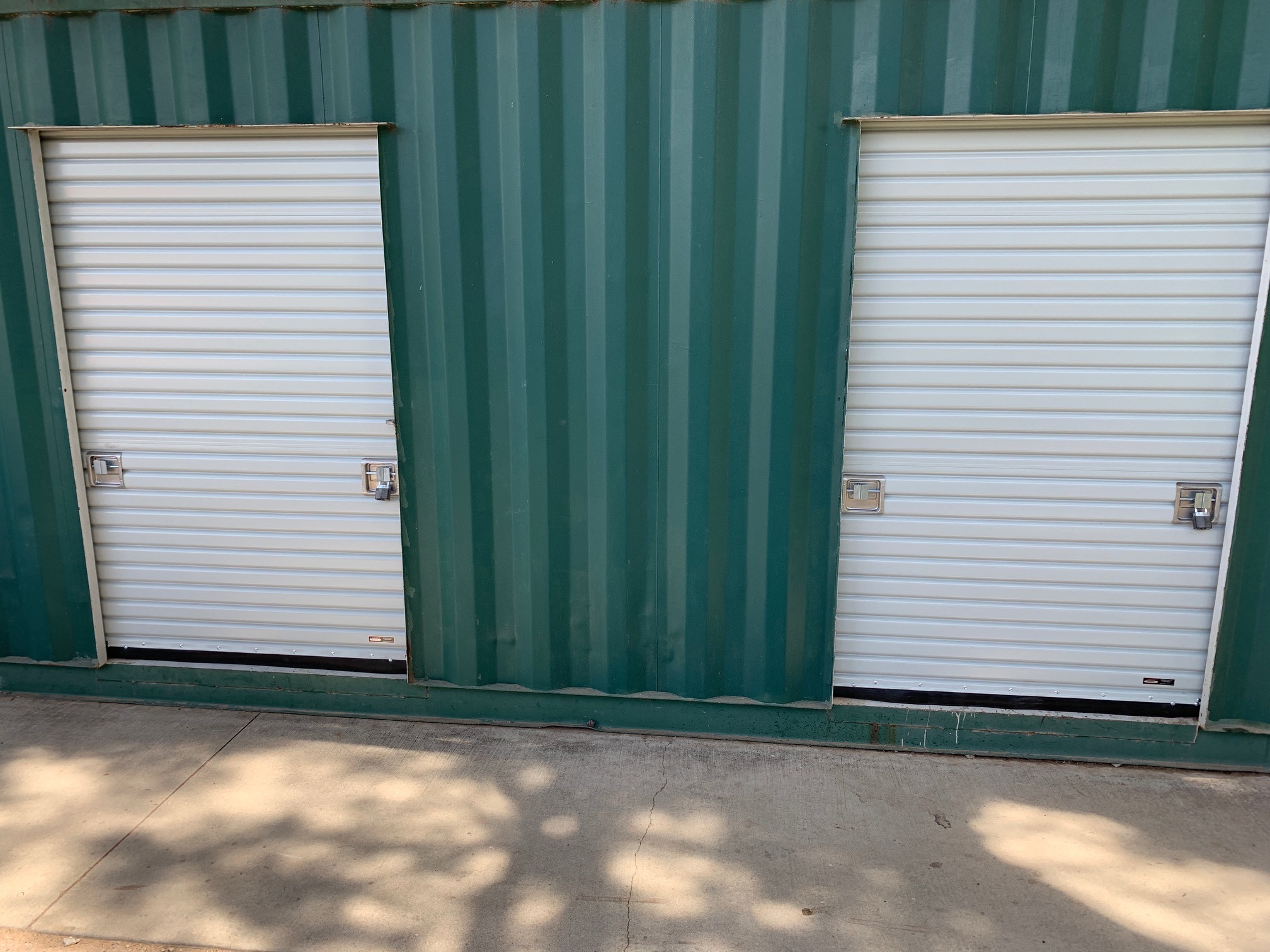 Butler Tereza Series 200 Original Sheet Door component detail — [drum assembly / weather seal / lock assembly / guide rail / chain operation / curtain section / full door view] (assign each to the appropriate detail based on order)