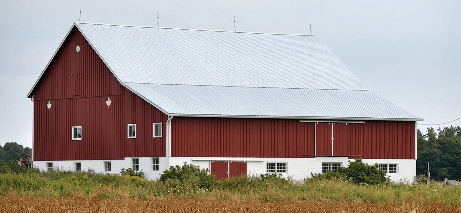Butler metal building after professional field repair showing restored roof panels wall panels and trim with matching Butler compatible materials and like-new appearance