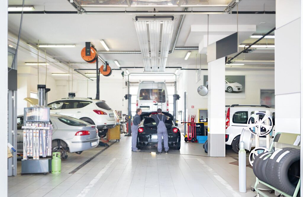 Butler Auto repair shop with car serviced by mechanics