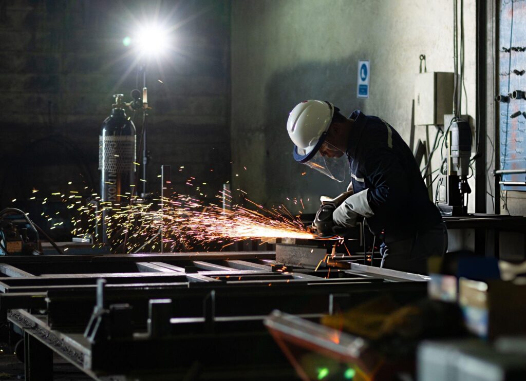 Butler Mental Welder worker grinding mental work in Manufacturing industry