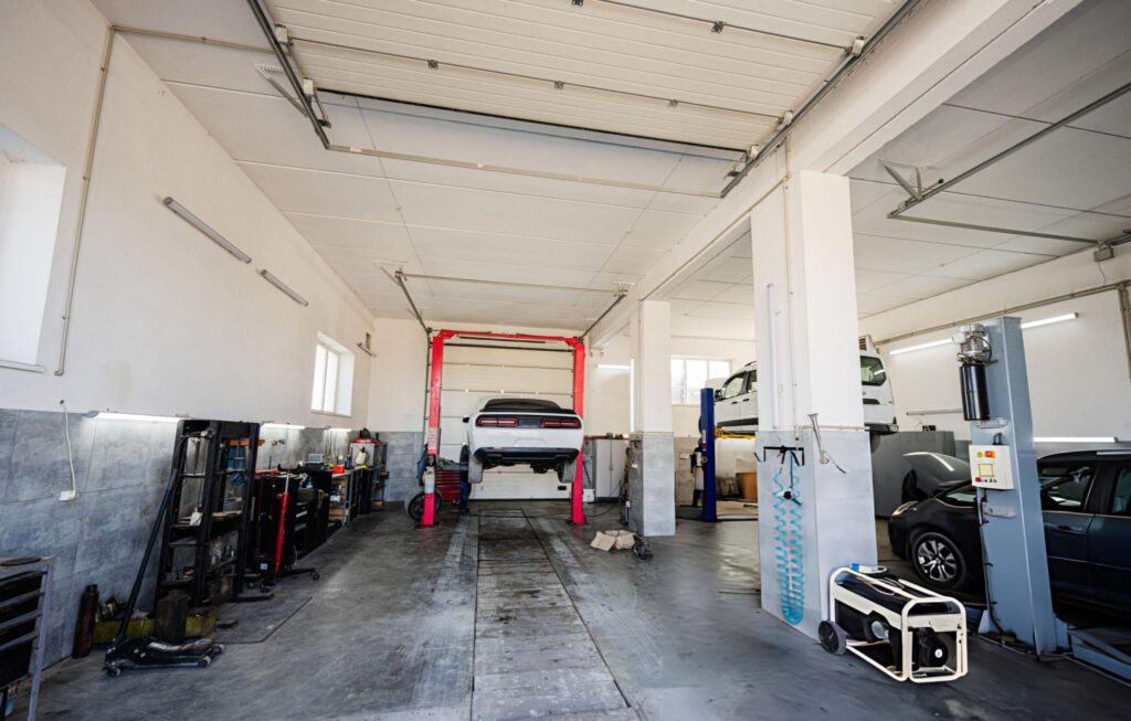 Butler Muscle car at service repair station in lift