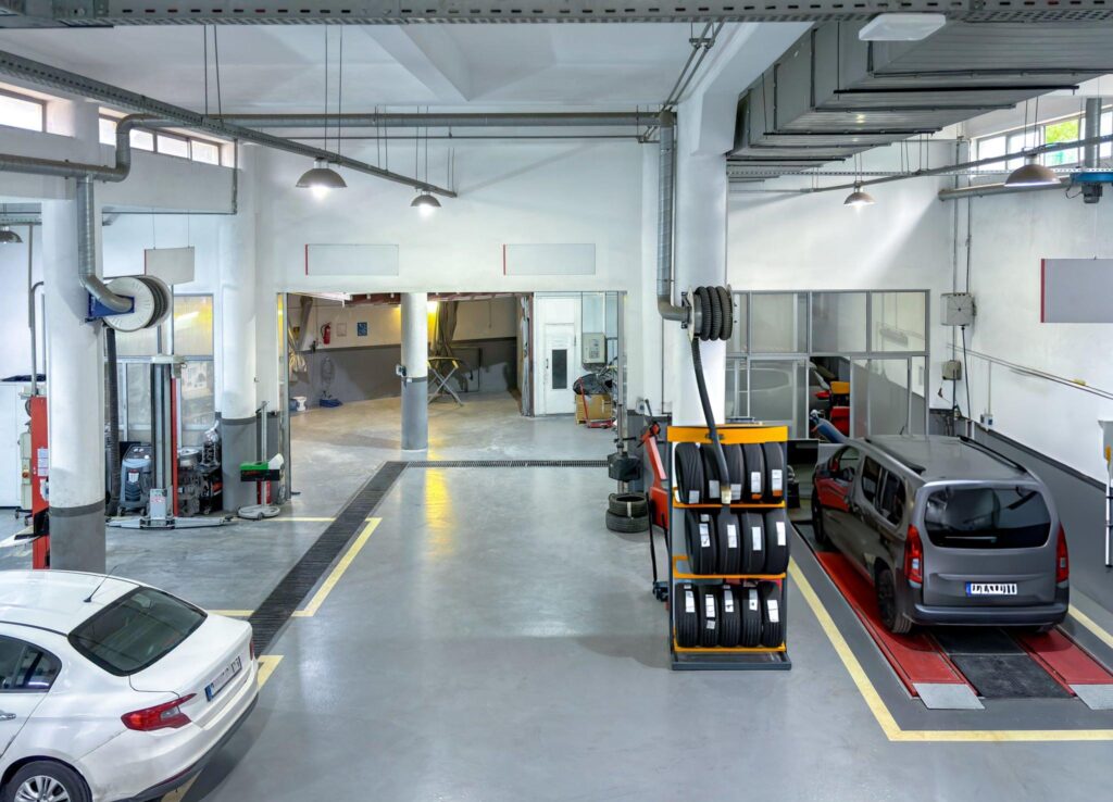 Butler New modern empty car repair service, interior top